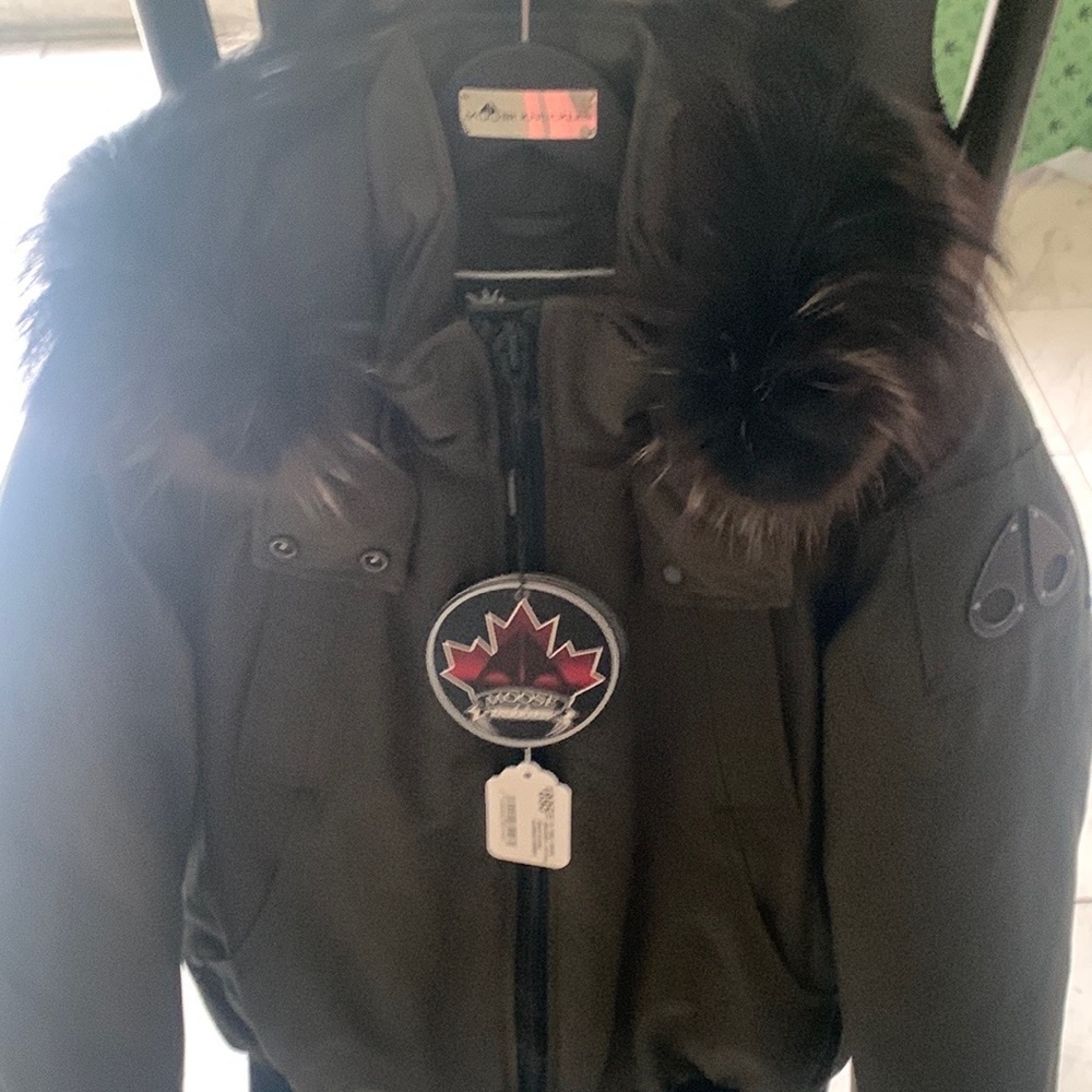 Brand new fur coat size M with tags